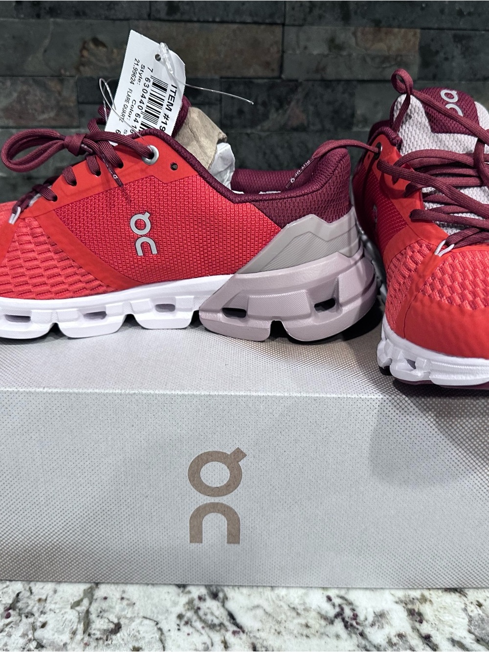 On Clouds Women's Running Sneakers in orange and red